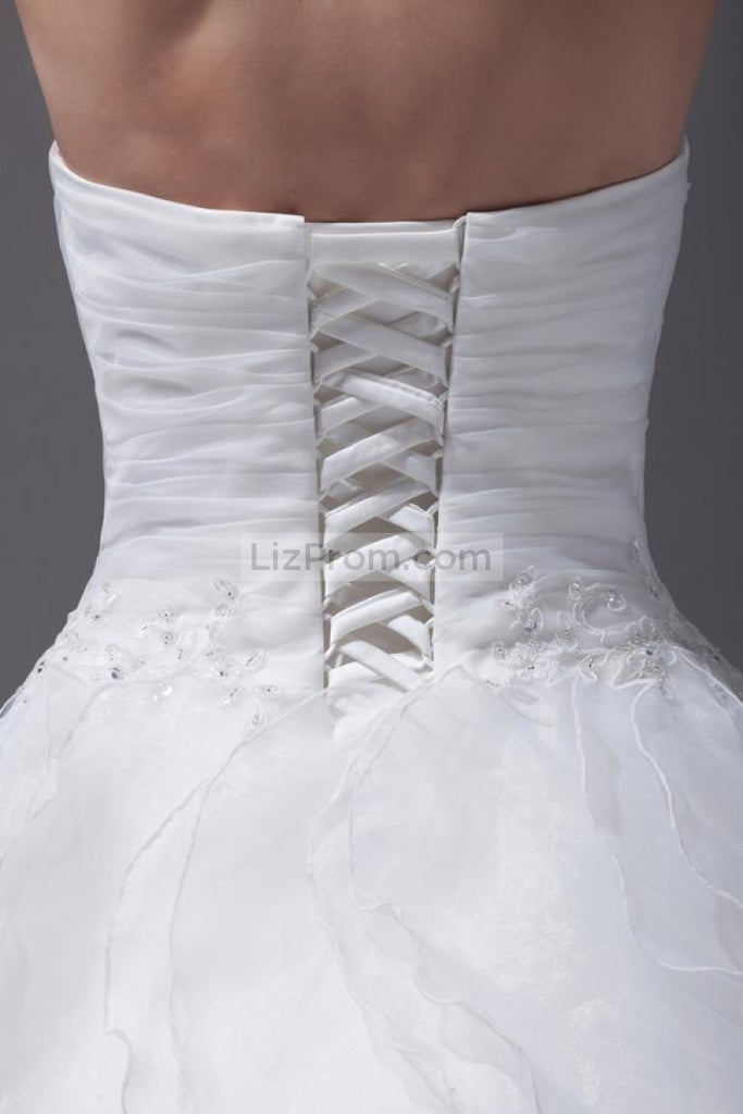 White Sweetheart Sleeveless Elegant Ball Gown Ruffled Wedding Dress